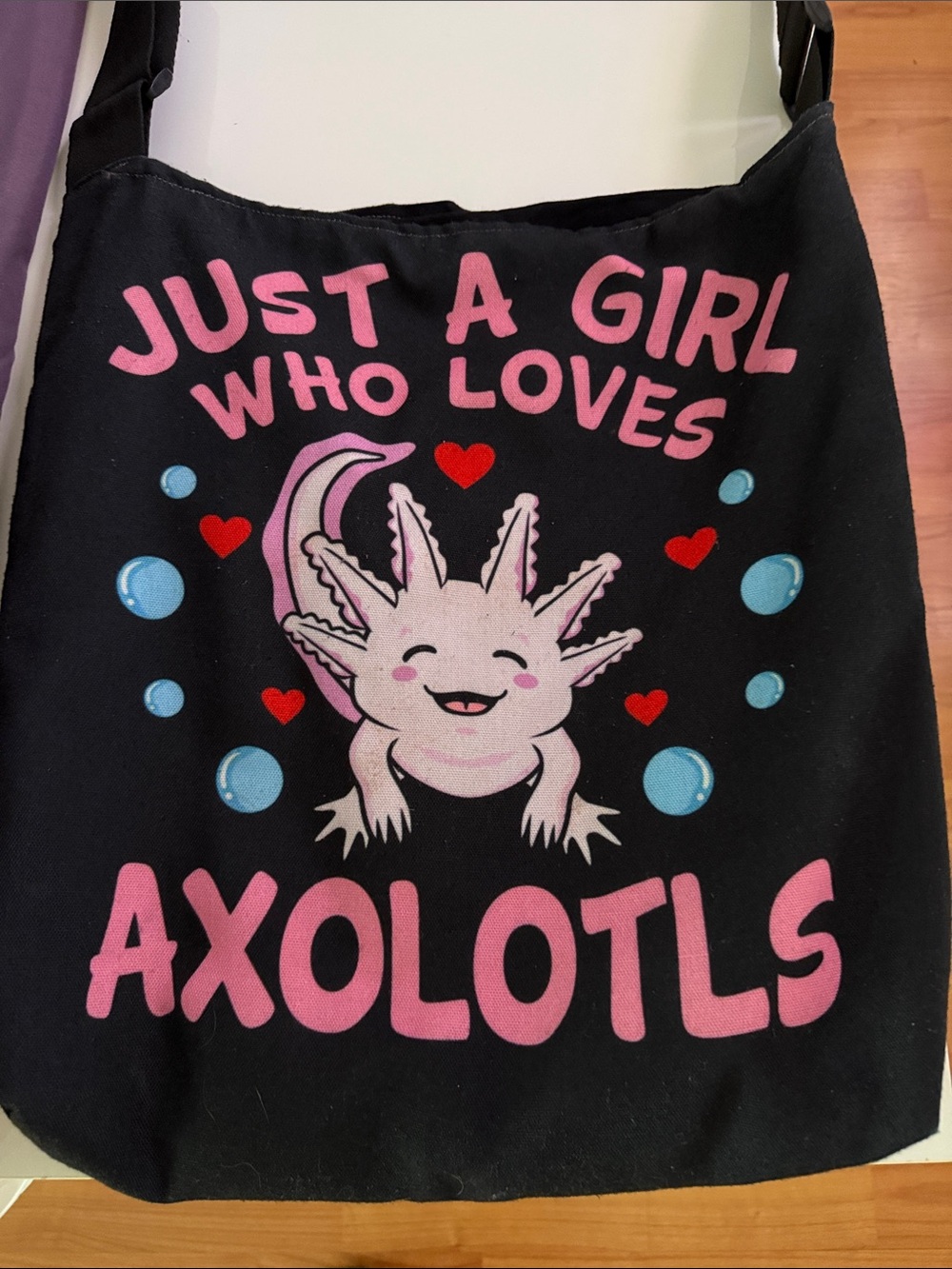 Black Canvas Crossbody Bag with Pink Axolotl Graphic